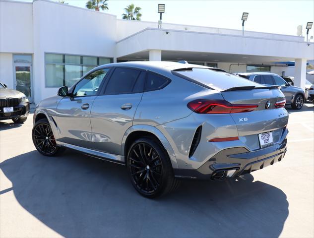 new 2025 BMW X6 car, priced at $83,900