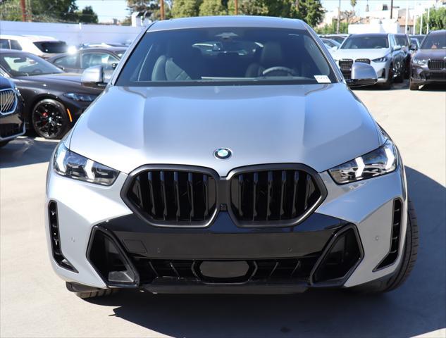 new 2025 BMW X6 car, priced at $83,900