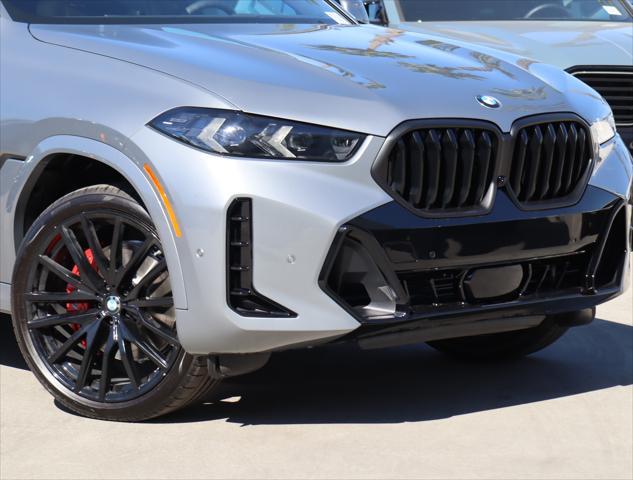 new 2025 BMW X6 car, priced at $83,900