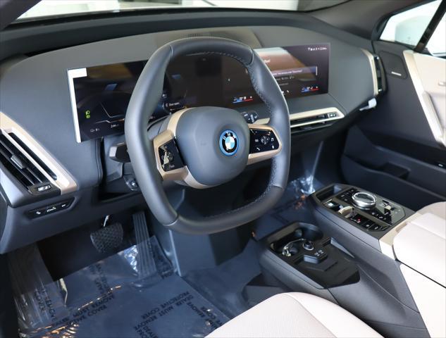 new 2025 BMW iX car, priced at $90,625