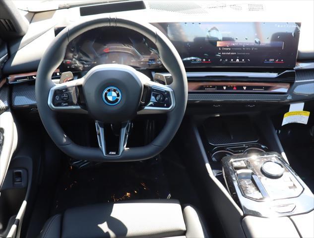 new 2026 BMW 550e car, priced at $84,300