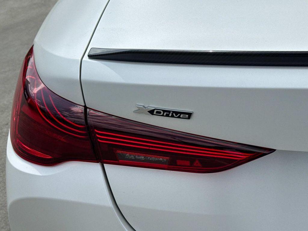 used 2025 BMW M4 car, priced at $92,880
