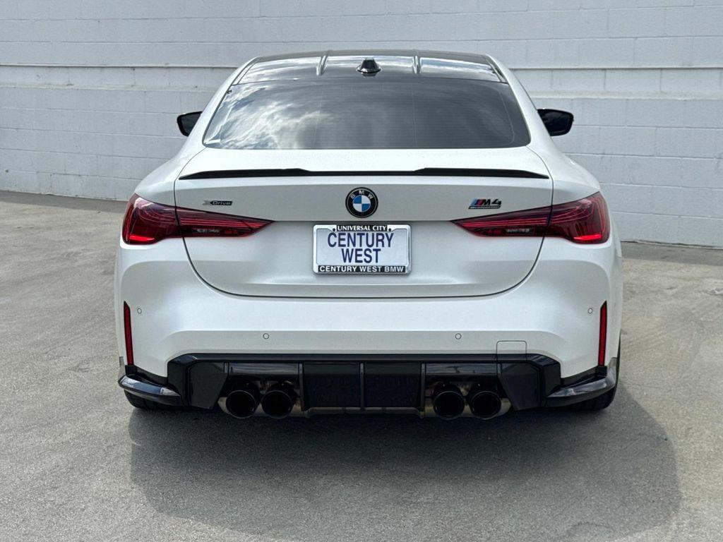 used 2025 BMW M4 car, priced at $92,880