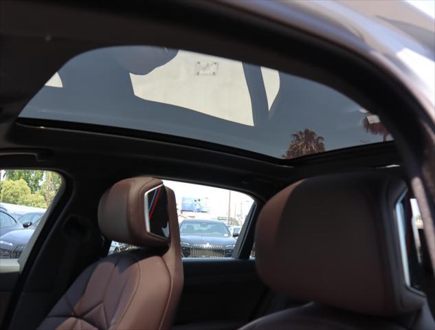 used 2024 BMW 740 car, priced at $78,845