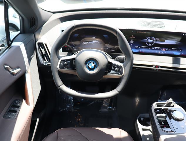 new 2025 BMW iX car, priced at $94,845