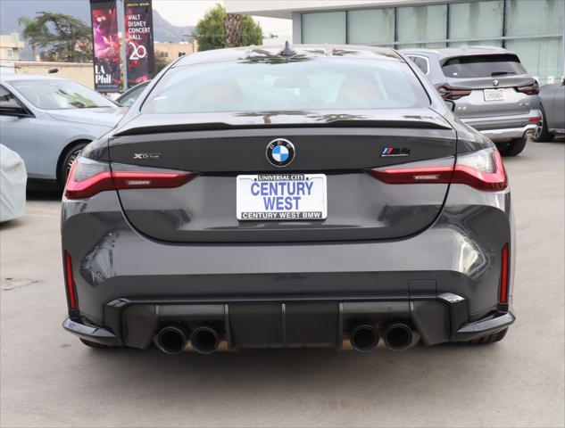 used 2023 BMW M4 car, priced at $97,995