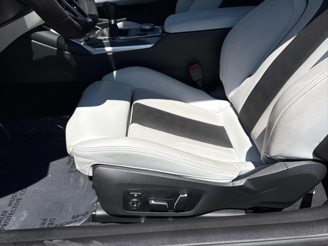used 2025 BMW M4 car, priced at $89,995