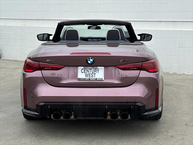 used 2025 BMW M4 car, priced at $105,995
