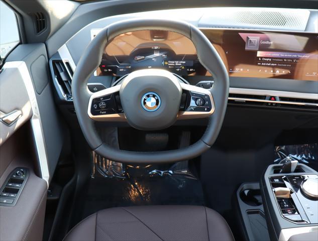 new 2025 BMW iX car, priced at $88,425