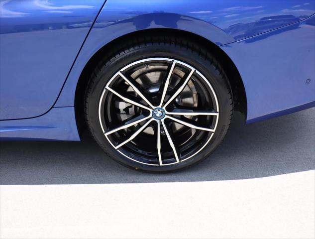 used 2023 BMW 330e car, priced at $36,880
