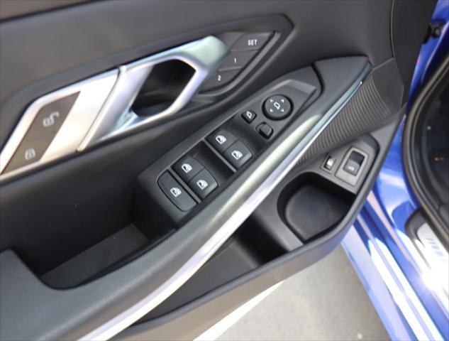 used 2023 BMW 330e car, priced at $36,880
