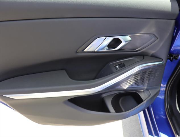 used 2023 BMW 330e car, priced at $36,880