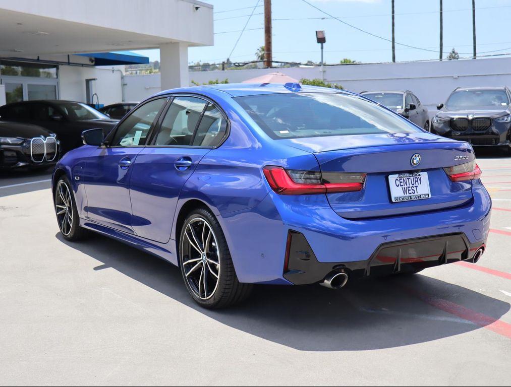 used 2023 BMW 330e car, priced at $30,880