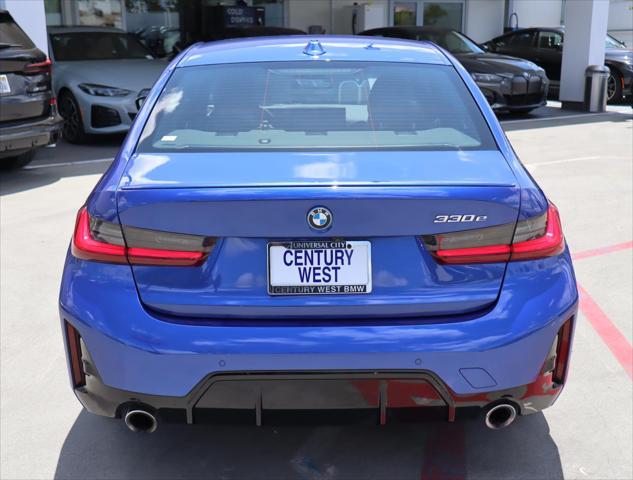 used 2023 BMW 330e car, priced at $36,880