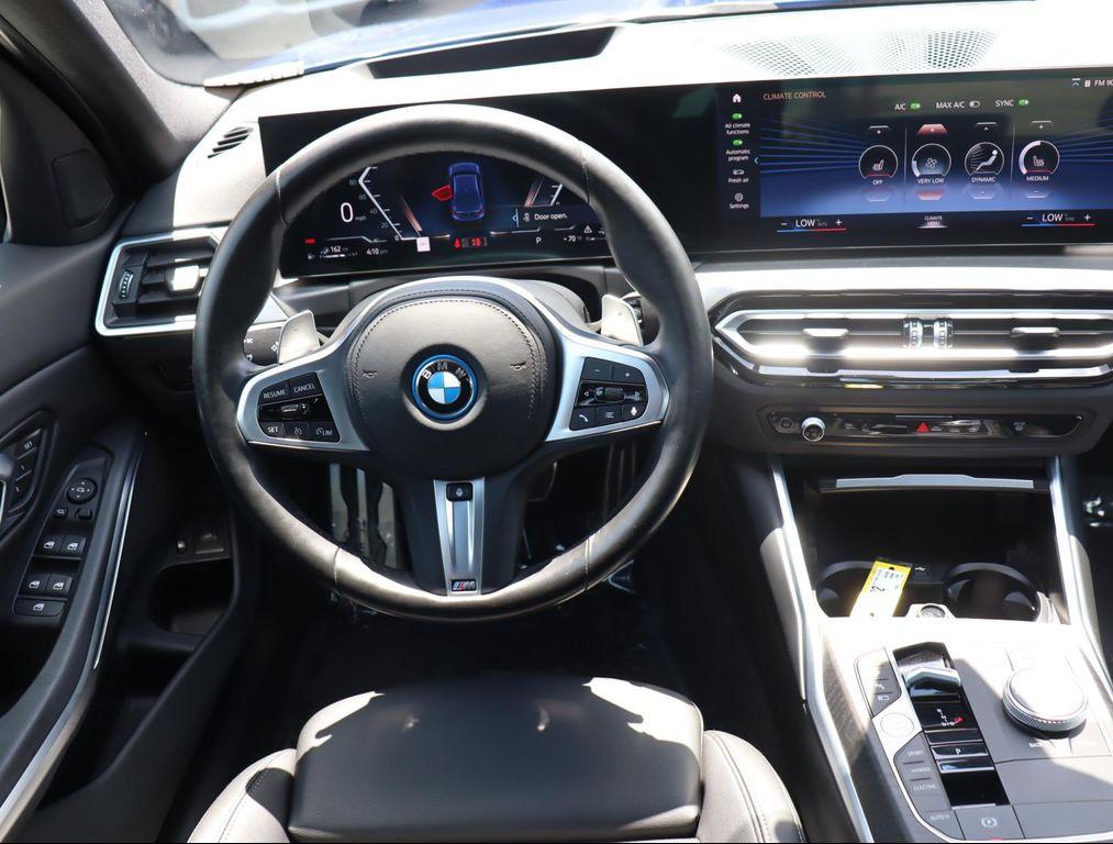 used 2023 BMW 330e car, priced at $30,880