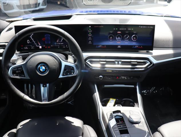 used 2023 BMW 330e car, priced at $36,880