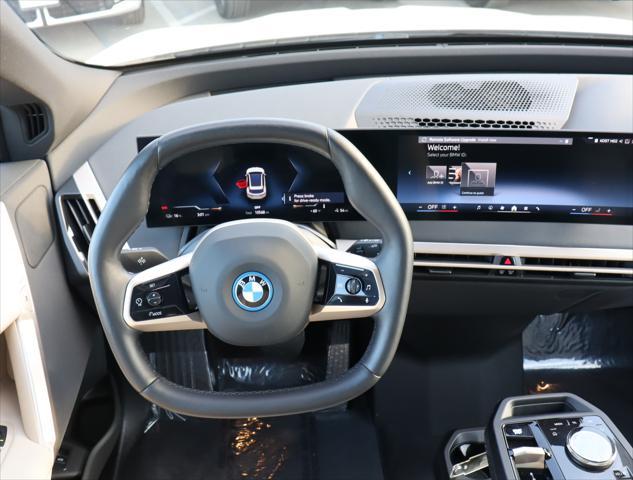 used 2024 BMW iX car, priced at $74,995