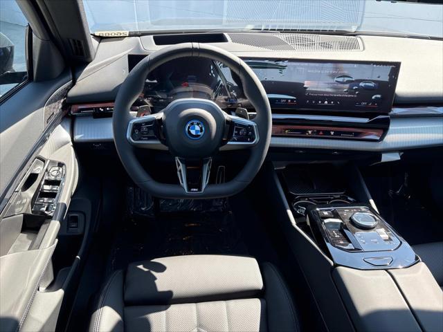 new 2026 BMW 550e car, priced at $81,375