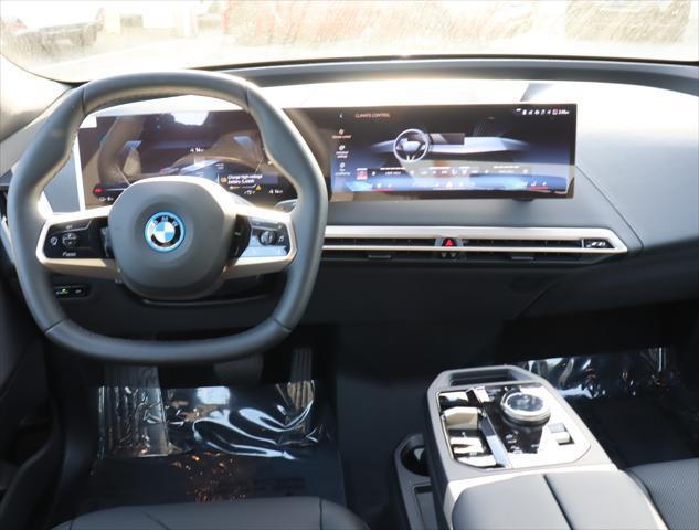 new 2025 BMW iX car, priced at $90,625