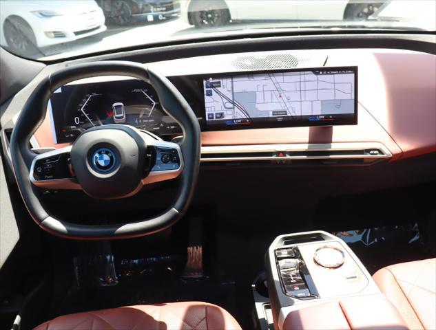 used 2023 BMW iX car, priced at $67,880