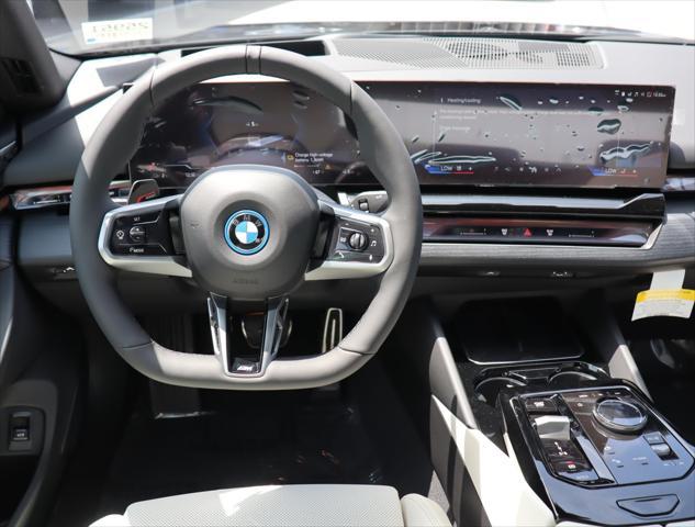 new 2025 BMW i5 car, priced at $77,475
