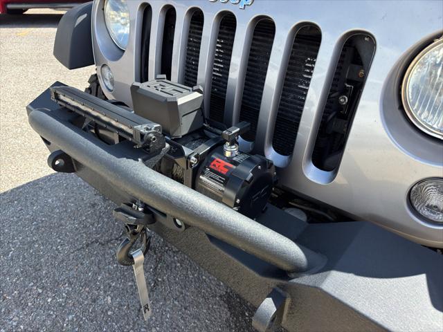 used 2014 Jeep Wrangler car, priced at $16,290
