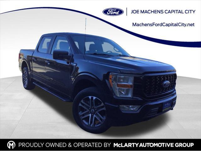 used 2021 Ford F-150 car, priced at $34,243