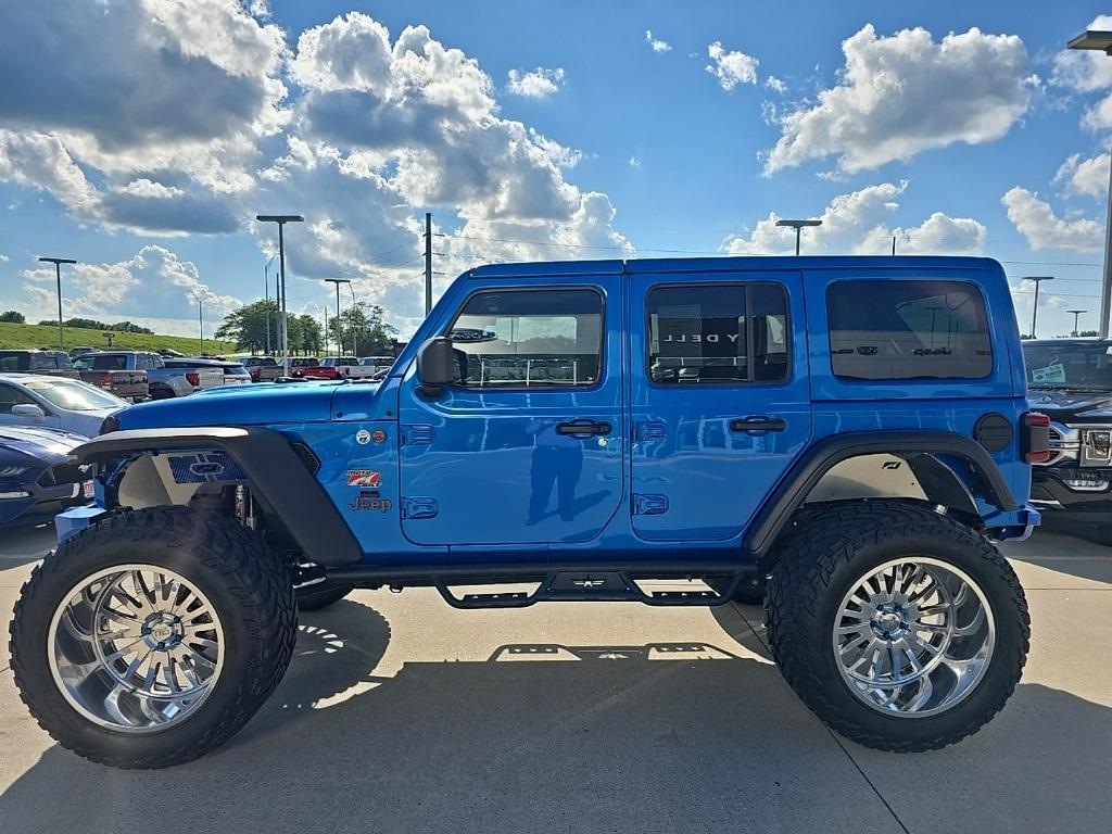 used 2021 Jeep Wrangler Unlimited car, priced at $38,259