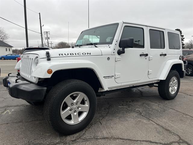 used 2015 Jeep Wrangler Unlimited car, priced at $23,490