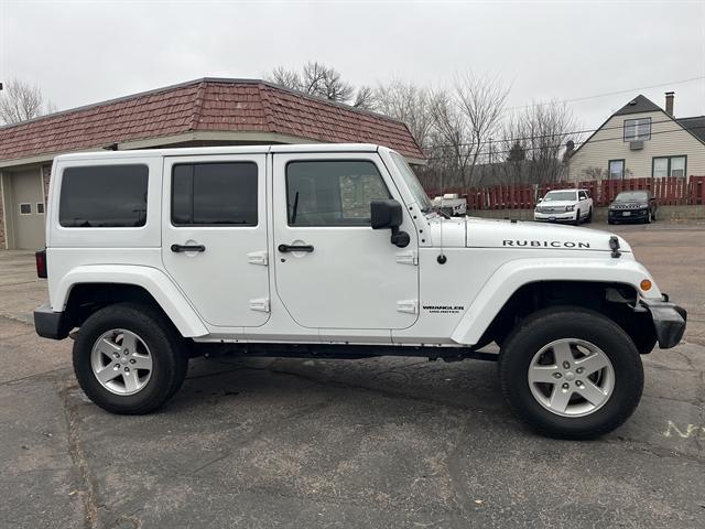 used 2015 Jeep Wrangler Unlimited car, priced at $23,490