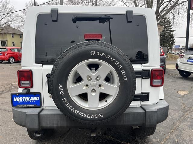 used 2015 Jeep Wrangler Unlimited car, priced at $23,490