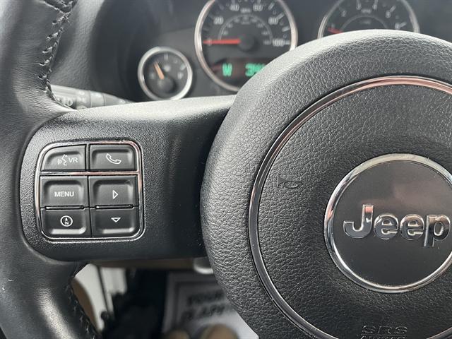 used 2015 Jeep Wrangler Unlimited car, priced at $23,490