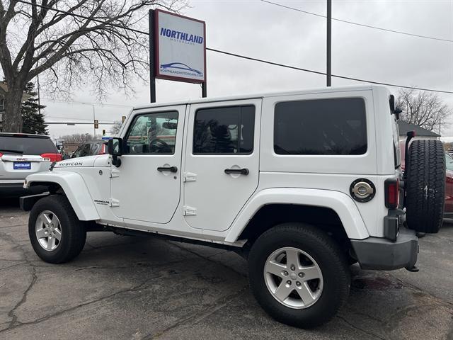 used 2015 Jeep Wrangler Unlimited car, priced at $23,490