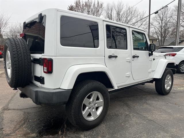 used 2015 Jeep Wrangler Unlimited car, priced at $23,490