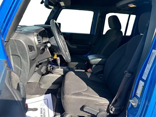 used 2015 Jeep Wrangler Unlimited car, priced at $18,390