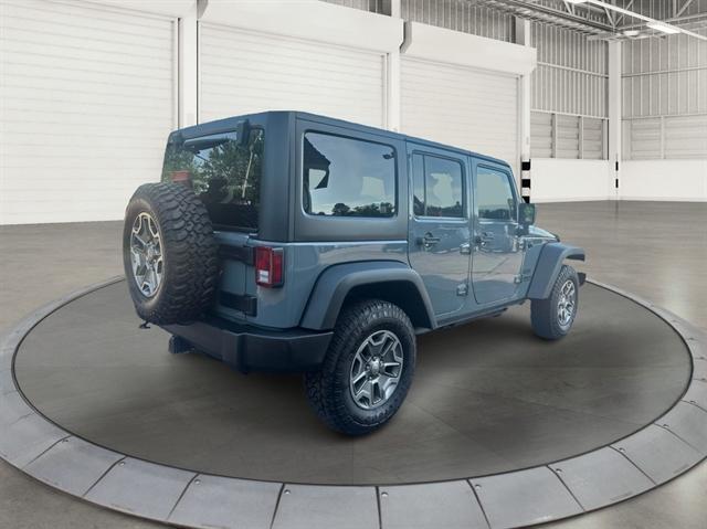 used 2015 Jeep Wrangler Unlimited car, priced at $14,990