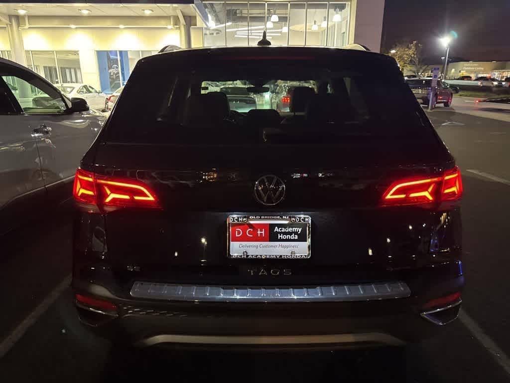 used 2023 Volkswagen Taos car, priced at $21,461