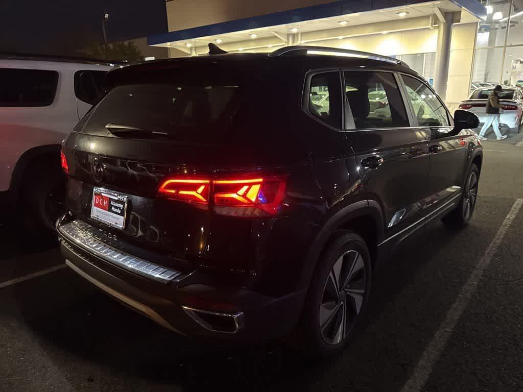 used 2023 Volkswagen Taos car, priced at $21,461