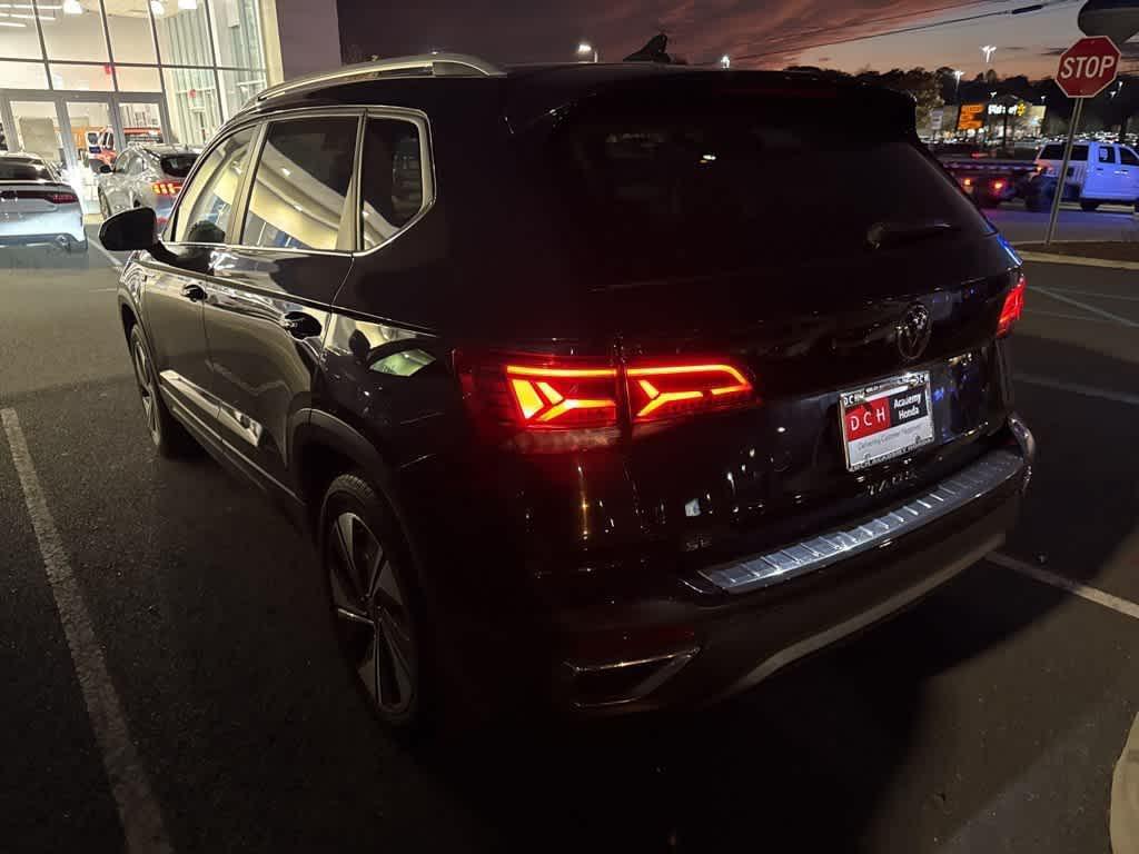 used 2023 Volkswagen Taos car, priced at $21,461