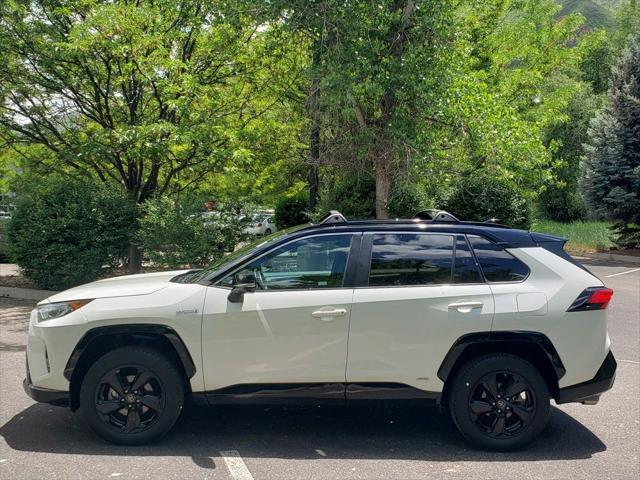 used 2019 Toyota RAV4 Hybrid car, priced at $28,599