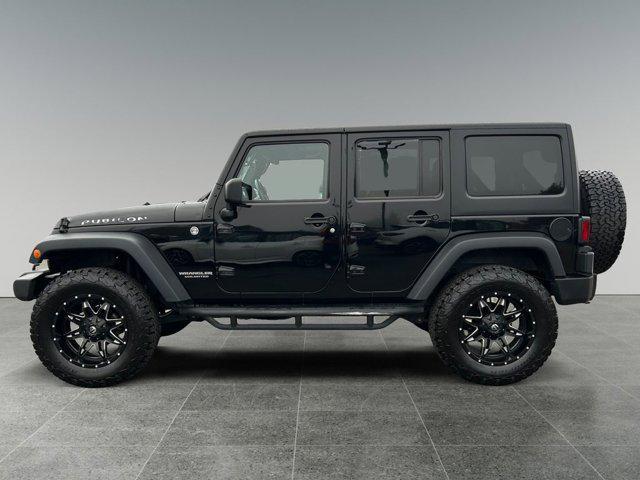 used 2015 Jeep Wrangler Unlimited car, priced at $26,825