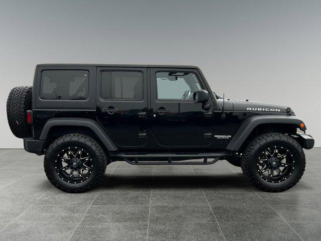 used 2015 Jeep Wrangler Unlimited car, priced at $26,825