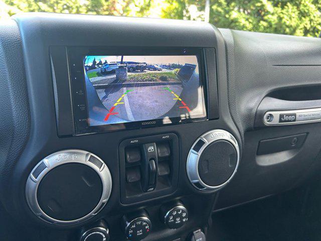 used 2012 Jeep Wrangler Unlimited car, priced at $16,985
