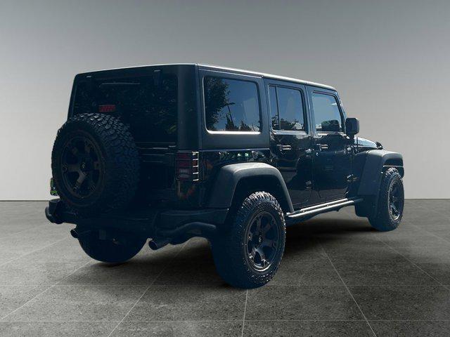 used 2012 Jeep Wrangler Unlimited car, priced at $16,985