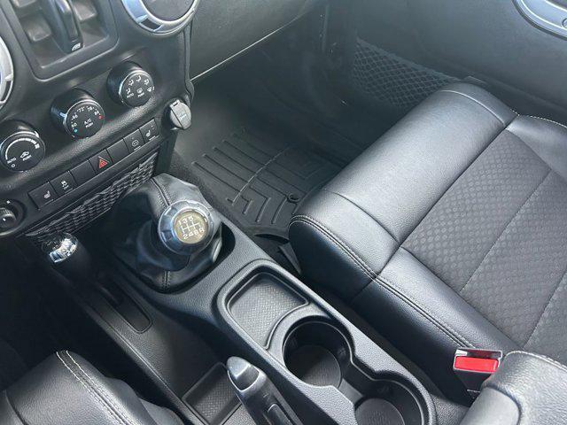 used 2012 Jeep Wrangler Unlimited car, priced at $16,985