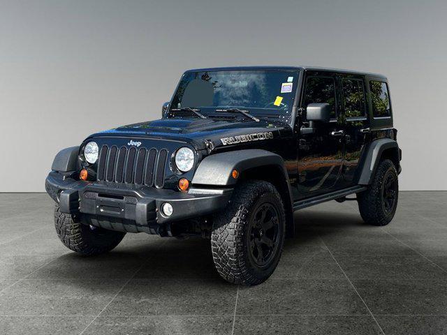 used 2012 Jeep Wrangler Unlimited car, priced at $16,985
