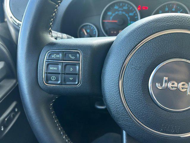 used 2012 Jeep Wrangler Unlimited car, priced at $16,985