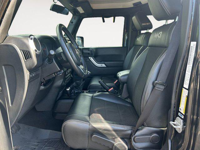 used 2012 Jeep Wrangler Unlimited car, priced at $16,985