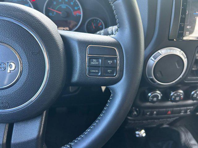 used 2012 Jeep Wrangler Unlimited car, priced at $16,985