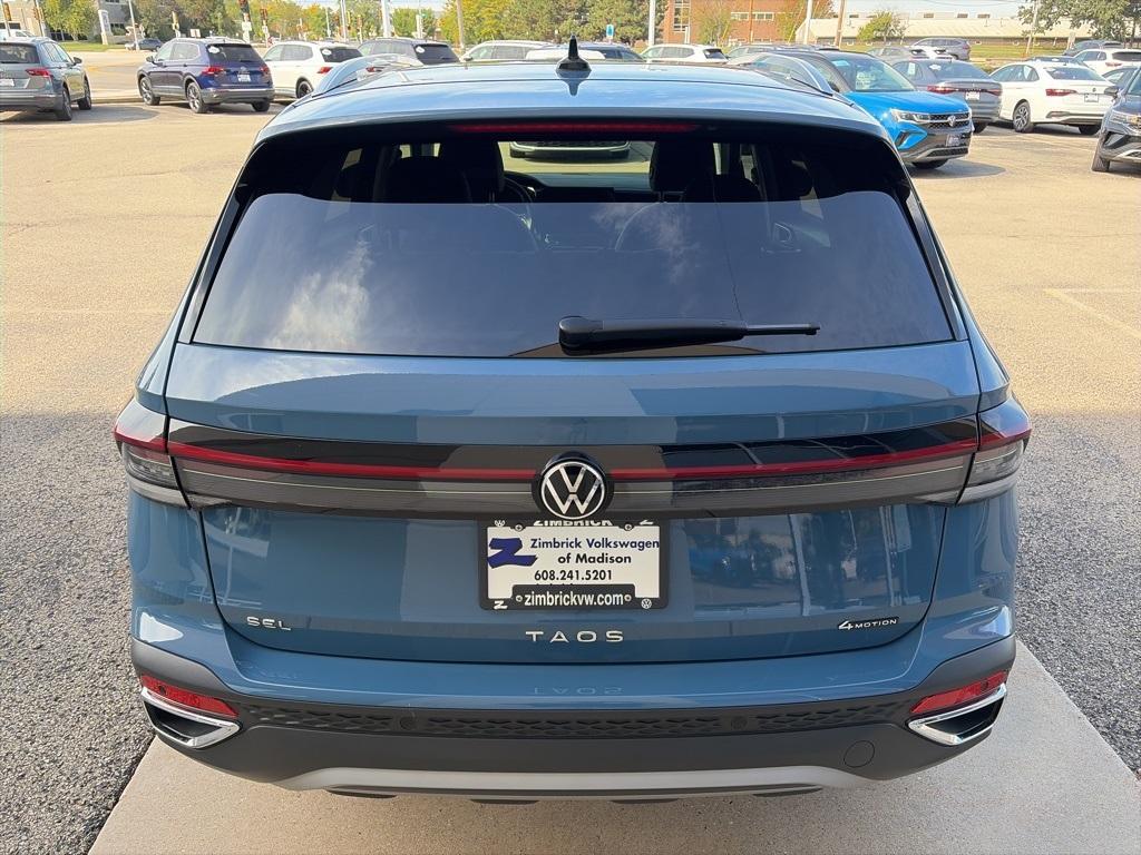 used 2025 Volkswagen Taos car, priced at $31,495